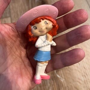 Vintage strawberry shortcake figure.
